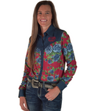 Woman wearing a colorful floral shirt with a blue collar and jeans on a white background