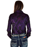 Person wearing a purple patterned shirt and blue jeans on a white background