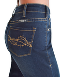 Close up of back pocket of the boot cut jeans on the model.