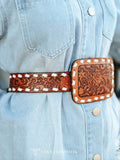 The Brown Tooled Genuine Leather Ivory Buckstitch Belt on a models waist.