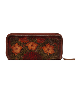 A dark red leather zip-around wallet featuring hand-tooled floral designs with orange flowers and green leaves, shown against a plain white background.
