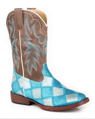 Glitter Blocks Little Kids boot by Roper showing blue glitter patchwork across the vamp, a vintage tan stitched shaft, white piping and a wide square toe