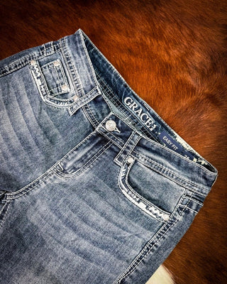 Ivory Patchwork Bootcut Jeans in Medium Dark Wash by Grace in LA – Apparel from Bronco Western Supply Co.