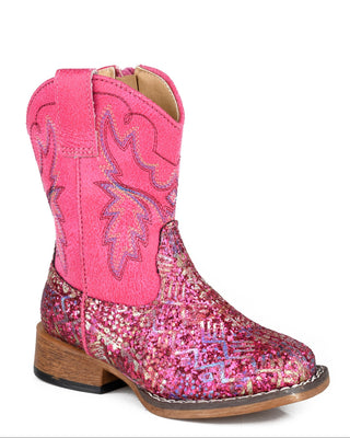 Glitter Aztec II Little Kids boot by Roper in fuchsia, showing a multicolor geometric glitter vamp, pink faux leather shaft and decorative western stitching