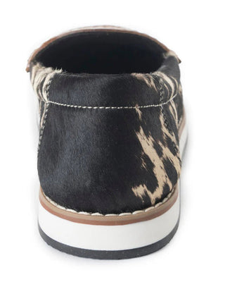 Black slip-on shoe with brown and white pattern on a white background