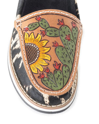 Shoe with sunflower and cactus design on a white background