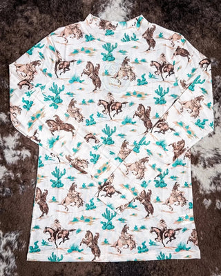 This mesh top? A total conversation starter. 🌵

The Chisholm Trail Mesh Top brings wild west vibes with soft stretch mesh that layers like a dream. Lightweight, breathable, and covered in cowboy charm.

Trust us, you’re gonna reach for this one all year long.