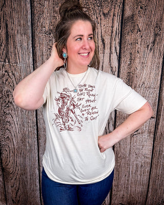Still in The Saddle Graphic Tee - Cream – Shirts & Tops from Bronco Western Supply Co.