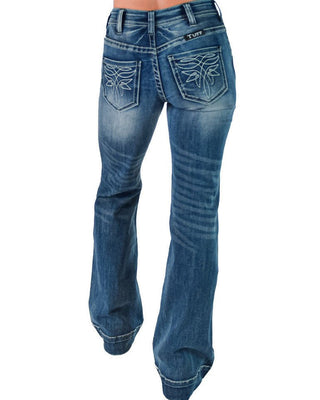 Blue jeans with decorative stitching on a white background