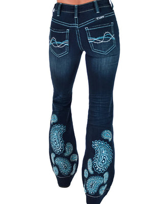 Rusty brand dark blue denim flare jeans with light blue paisley embroidery on the lower legs and white contrast stitching, shown from the back.