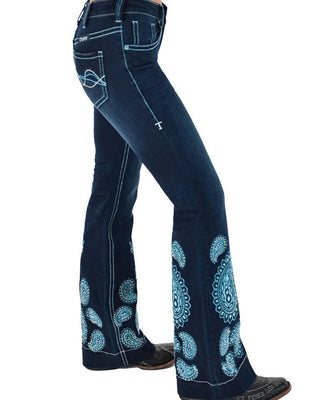 Dark blue denim flare jeans with light blue paisley embroidery on the lower legs and white contrast stitching, shown on a model from the waist down against a white background.
