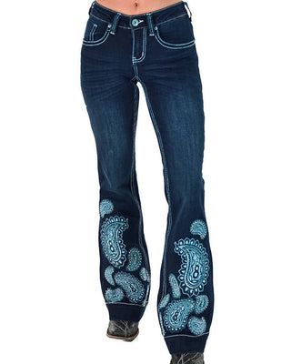 Dark blue denim jeans with a flared leg, featuring light blue and white paisley embroidery on the lower legs, shown on a model from the waist down against a white background.
