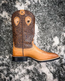 Side view of the Sienna Twisted X Women's 11" Ruff Stock Boot displayed on cowhide.
