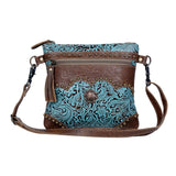 Front view of the Azure Aesthetic Leather & Hairon Bag in a white back drop.