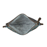 Inside of the Azure Aesthetic Leather & Hairon Bag in a white backdrop. 