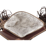 Inside of the Sandy Rosewood Hand-Tooled Bag in a white back drop.